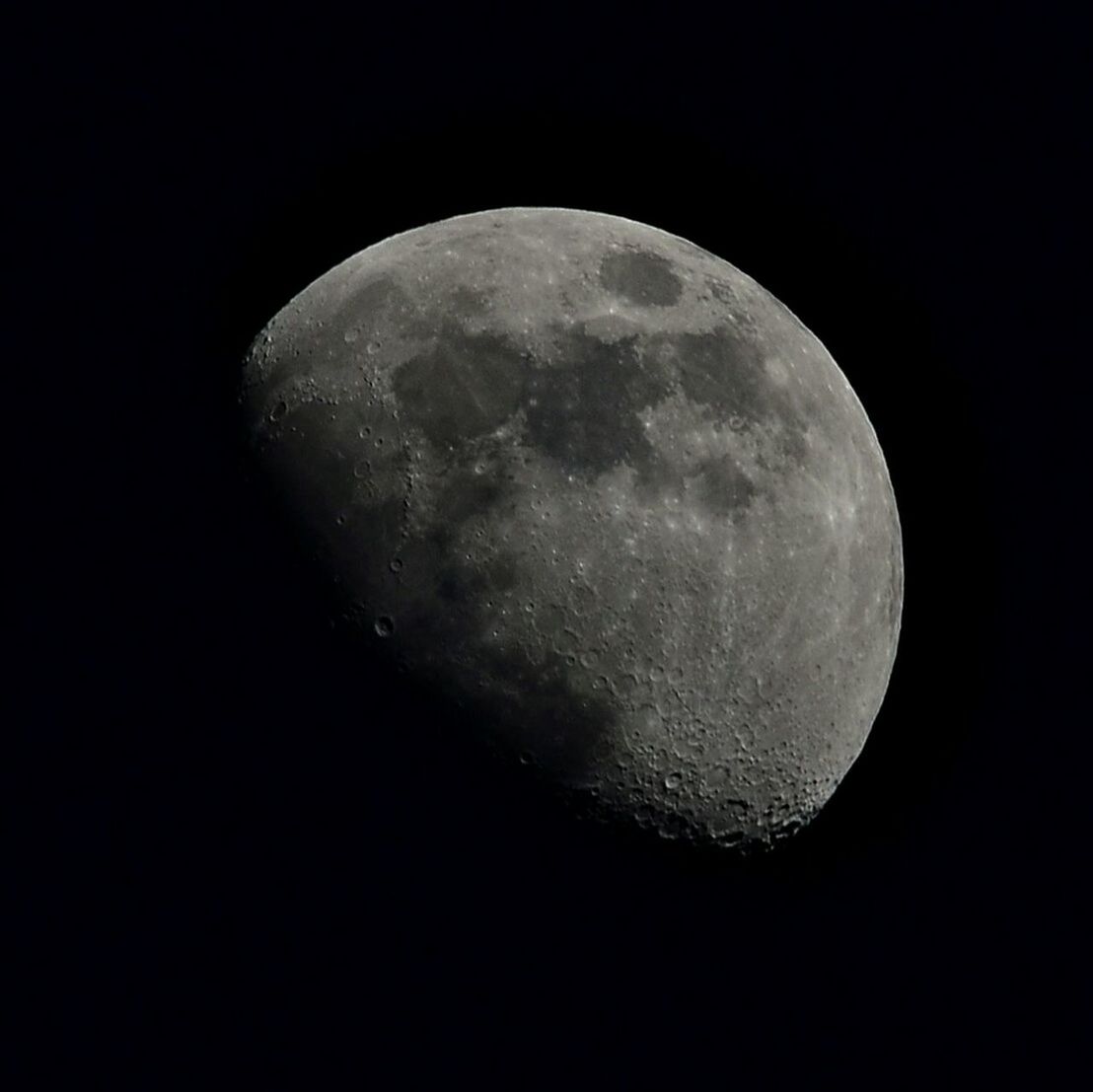 astronomy, night, moon, planetary moon, full moon, moon surface, discovery, space exploration, sphere, dark, circle, low angle view, beauty in nature, copy space, sky, nature, tranquil scene, exploration, scenics, tranquility