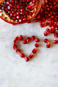 High angle view of strawberries on table