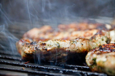 Close-up of meat on barbecue grill