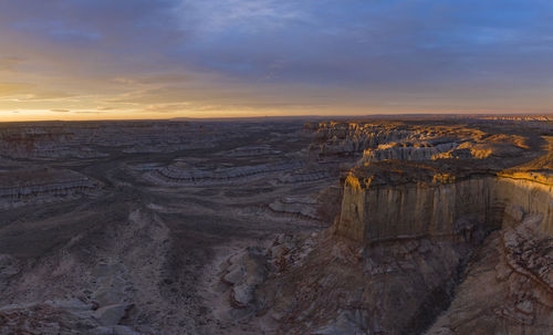 Epic sunrise aerial panorama above massive coal mine canyon on n