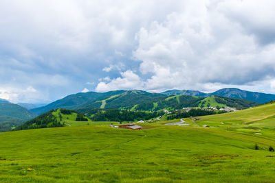 A picturesque landscape view of the french alps mountains on a cloudy summer day