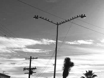 Low angle view of street light against sky