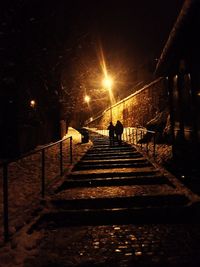 Illuminated street light at night