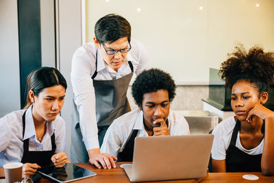 Business colleagues working at office