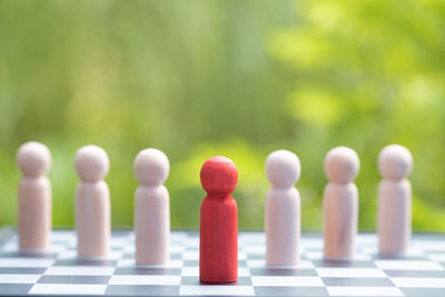 Close-up of chess pieces on table