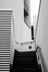 Close-up of stairs against building