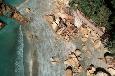 Aerial view of rocks at beach 
