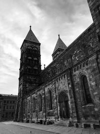 Low angle view of cathedral against cloudy sky