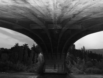 Arch bridge over river