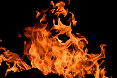 Close-up of fire against black background