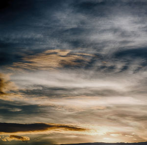 Low angle view of dramatic sky during sunset