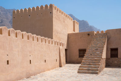 Courtyard of a small medieval arabian fort in bukha, oman. 