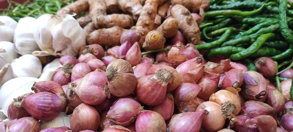 Full frame shot of onions for sale in market