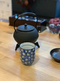 Close-up of japanese style tea cup on table at a restaurant 