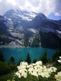 Scenic view of mountains and lake against sky