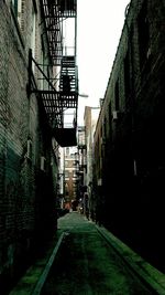 Narrow alley along buildings