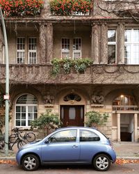 Car in front of building