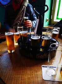 Close-up of beer glass on table