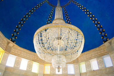 Low angle view of illuminated ceiling of building arabic islamic mosque