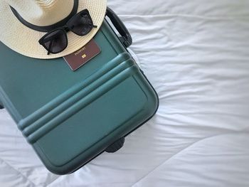 High angle view of hat on bed