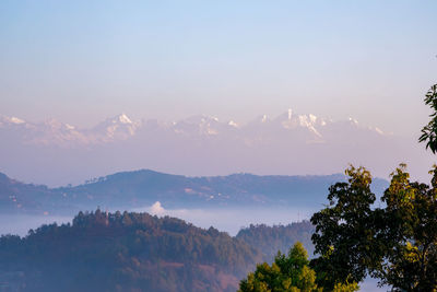 Scenic view of mountains against sky during sunset