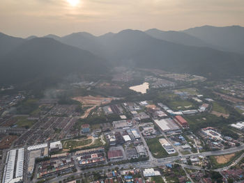 High angle view of townscape against sky in city