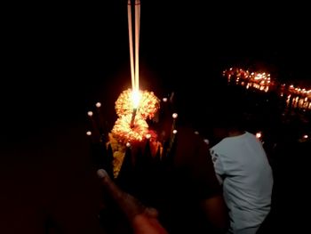 Close-up of firework display at night