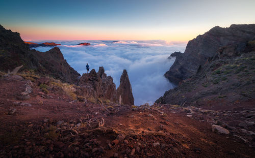 Scenic view of mountains against sky during sunset