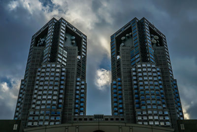 Low angle view of modern building against sky