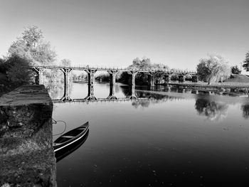 Bridge over river against sky