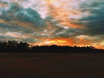 Scenic view of dramatic sky during sunset