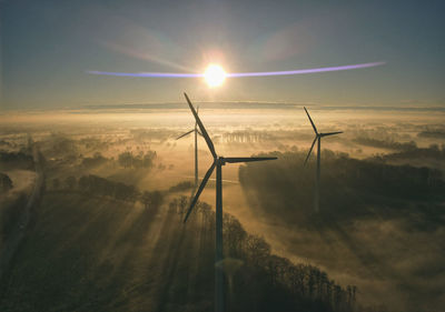 Scenic view of landscape against sky during sunset