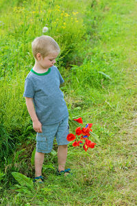 Full length of boy on field