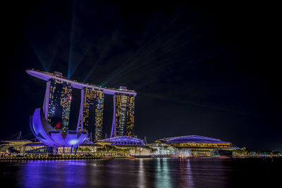 Illuminated marina bay at night