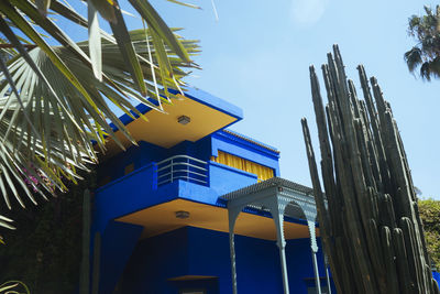 Low angle view of built structure against blue sky