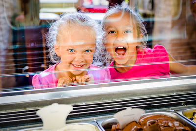 Portrait of smiling girls in store