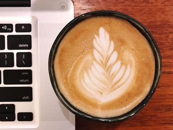 High angle view of cappuccino on table