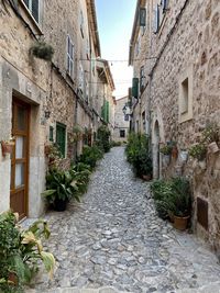 Narrow alley along old buildings