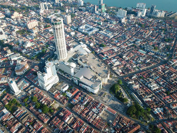 Aerial komtar building with heritage house.