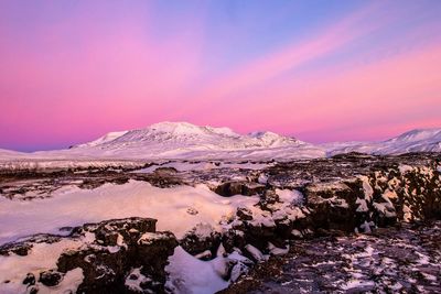 Scenic view of mountains against sky during winter