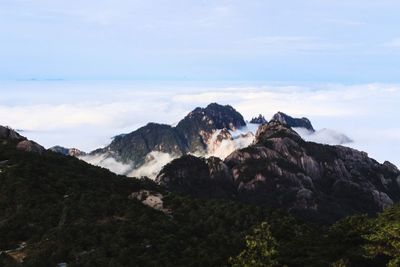 Scenic view of rocky mountains against sky