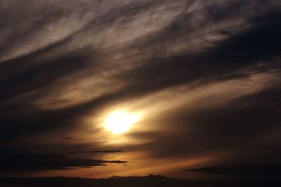 Low angle view of dramatic sky during sunset
