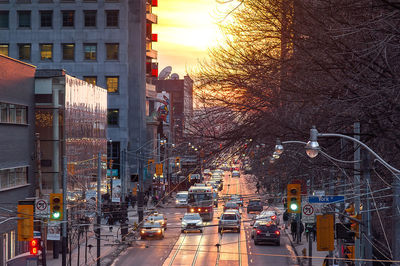 View of city street at sunset