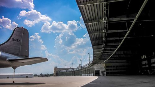 Low angle view of airport and building against sky