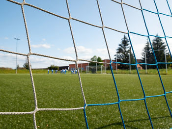 Soccer field in the bright light of summer day. prepared playground for finnal match