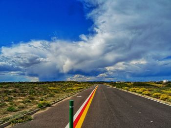 Surface level of empty road along landscape