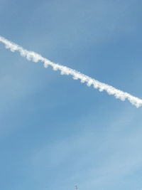 Low angle view of vapor trail in sky