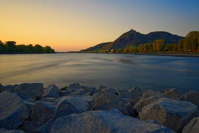 Scenic view of sea against sky during sunset