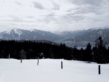 Scenic view of snow mountains against sky