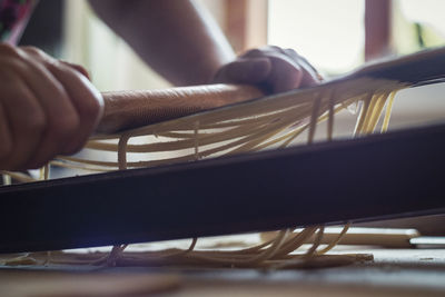 Close-up of man on table